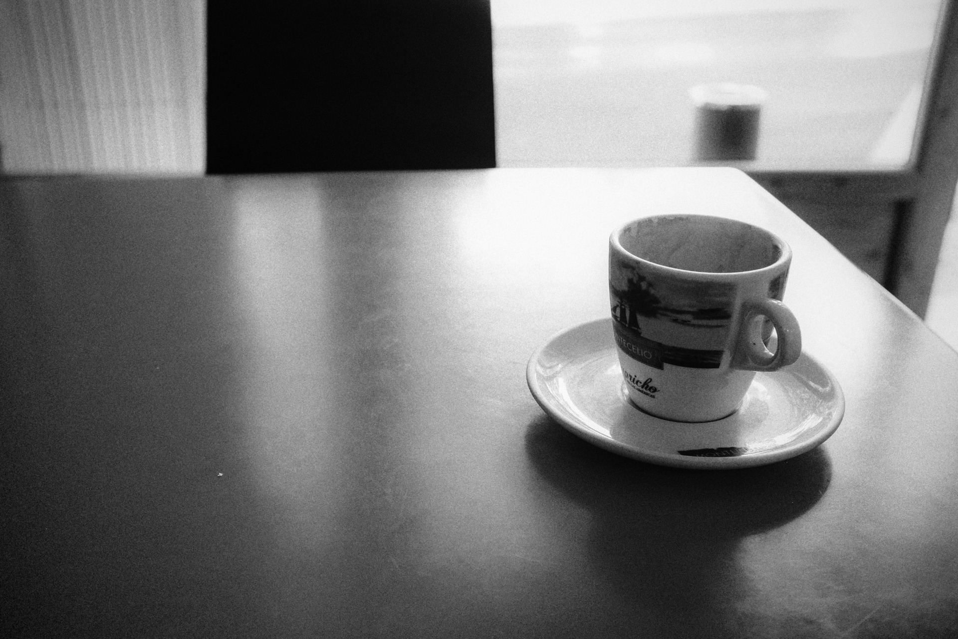 A coffee cup on a café table